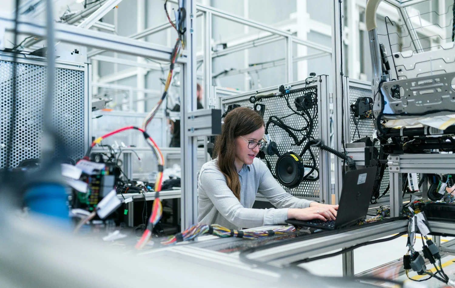 Engineer working with industrial automation equipment